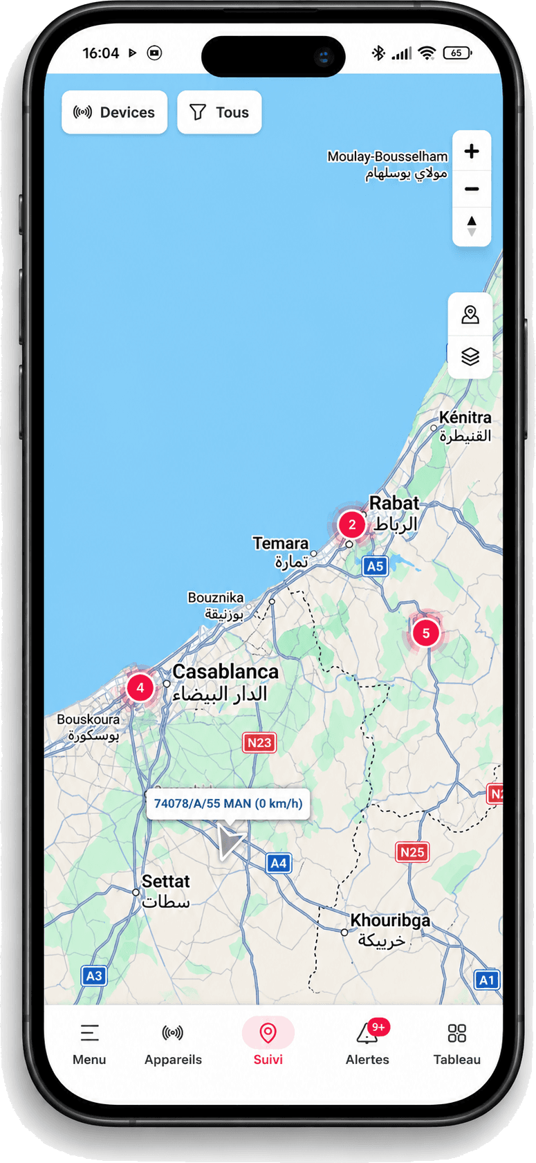 Trackisy mobile app showing the live tracking map of Morocco with clustered vehicle markers and a selected vehicle near Berrechid
